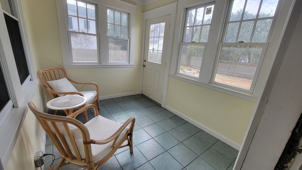 31 Plymouth Road Needham, MA 02492 - Photo 11 of 22 a view of a room with furniture and windows