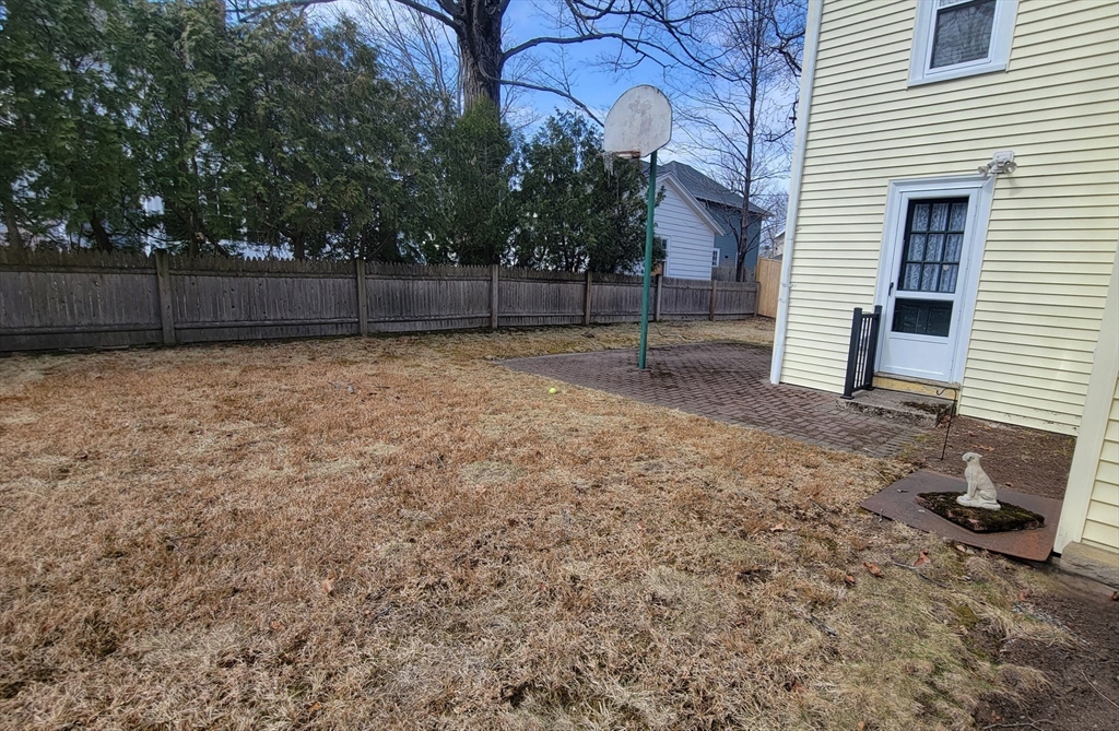 31 Plymouth Road Needham, MA 02492 - Photo 20 of 22 a backyard of a house
