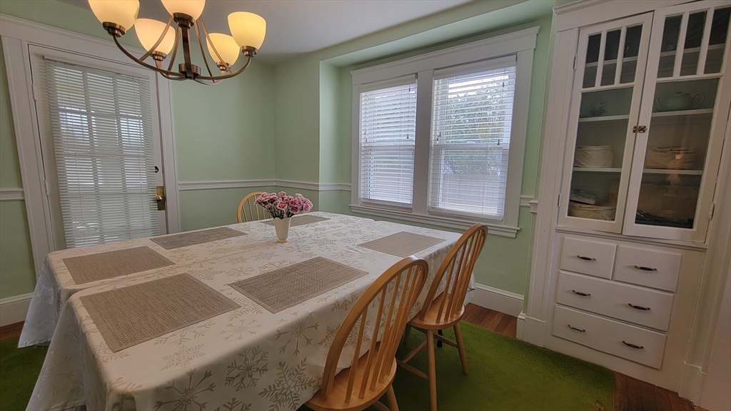 31 Plymouth Road Needham, MA 02492 - Photo 8 of 22 a dining room with furniture and window