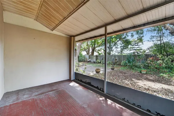 a view of a room with porch and outdoor space