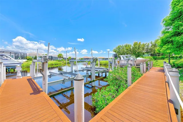 a view of a patio with a table chairs and a patio