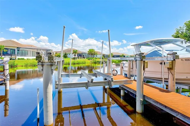 a view of a balcony with wooden floor