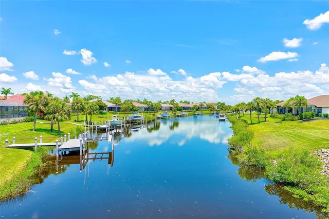 a view of a lake with a garden