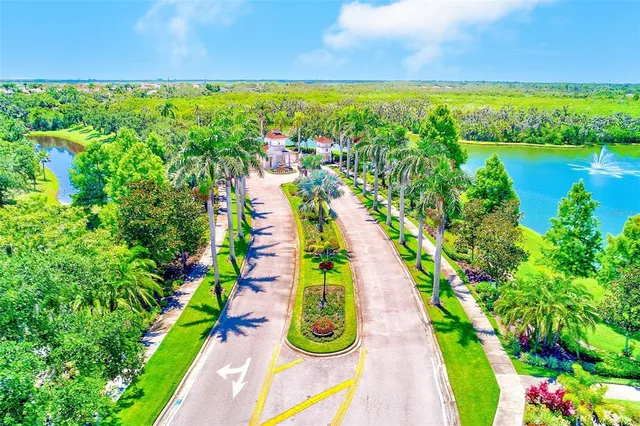 a wooden bench sitting in front of a building