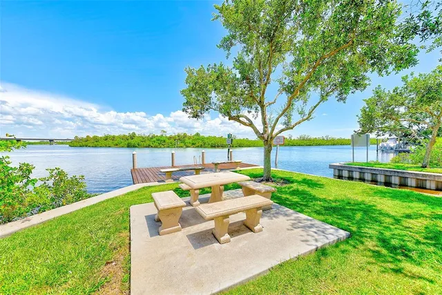 a view of a lake with a big yard