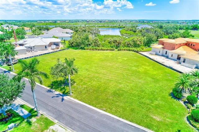 a view of a lake with a big yard