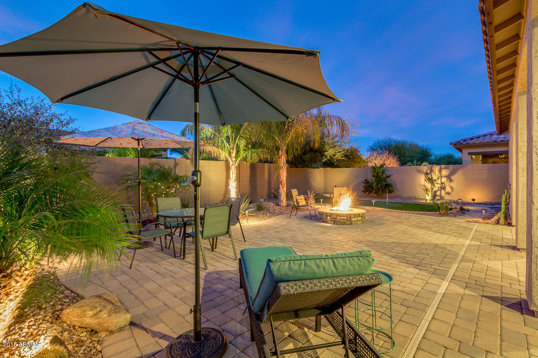 15770 West Coronado Road Goodyear, AZ 85395 - Photo 6 of 50 Pavers Galore throughout the Backyard