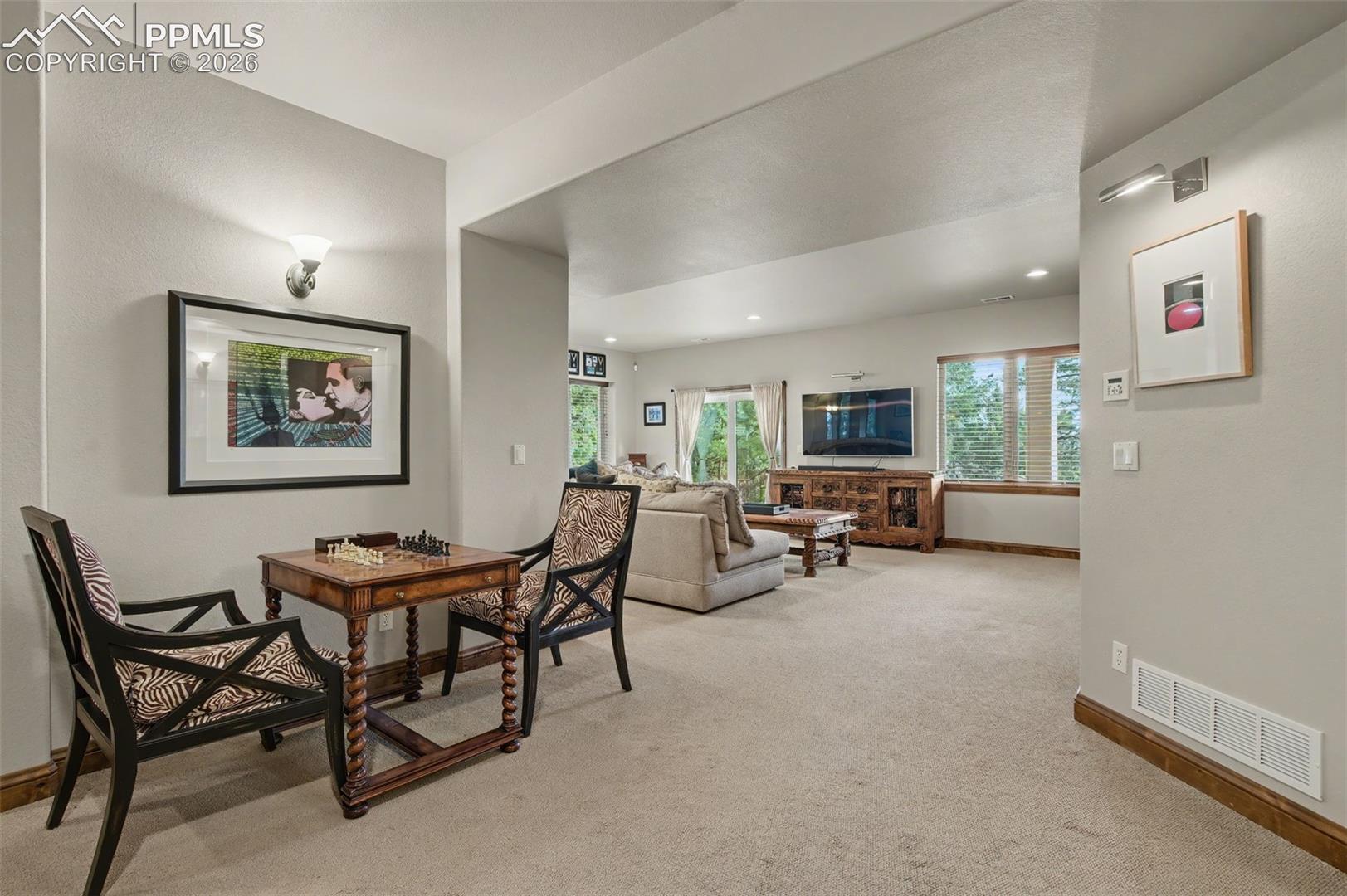 870 Mont Blanc View Colorado Springs, CO 80906 - Photo 23 of 42 Create a cozy game night setting or simply relax in this brilliant extension of your living space