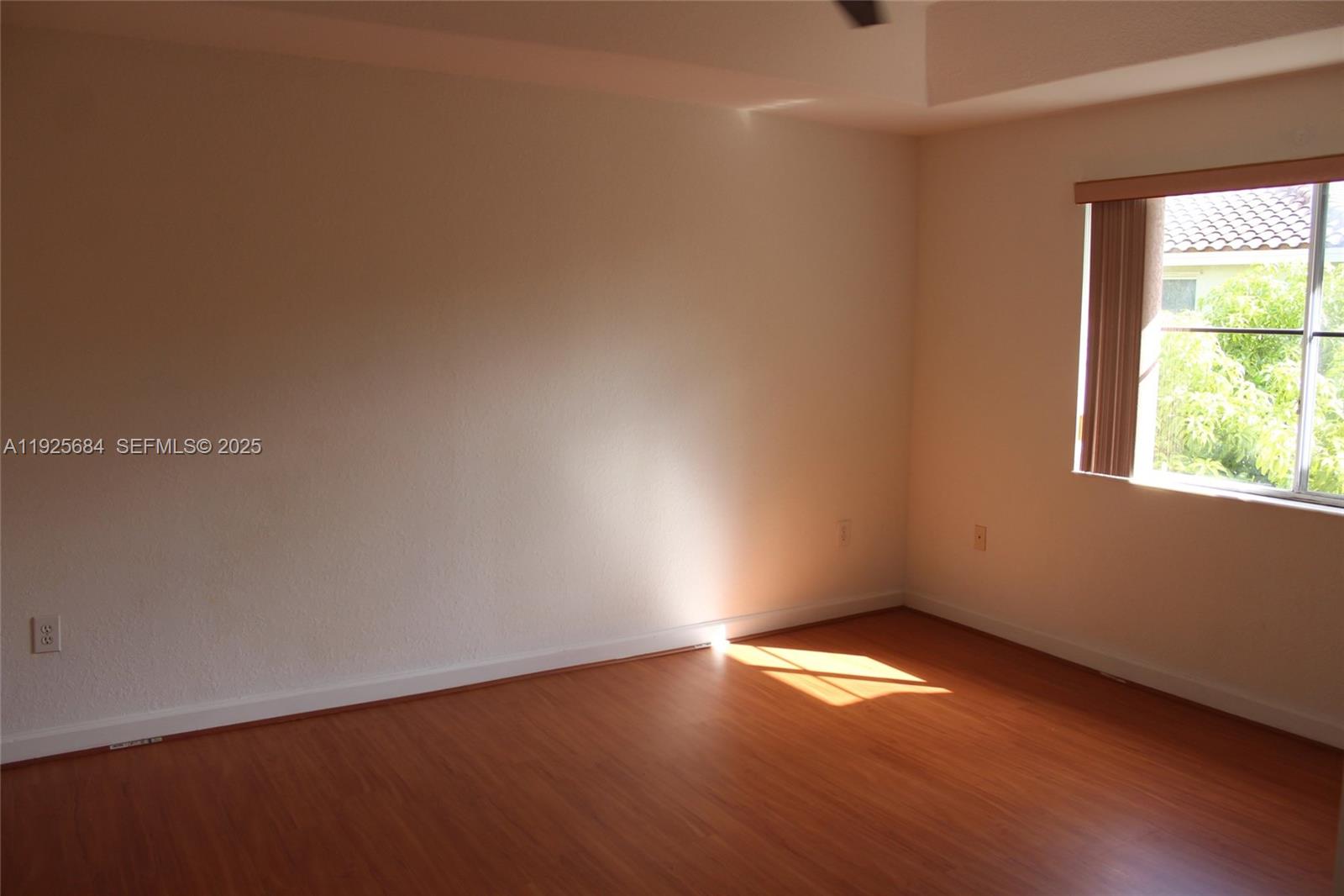 3433 Southwest 171st Terrace, Unit 3433 Miramar, FL 33027 - Photo 16 of 22 an empty room with a window