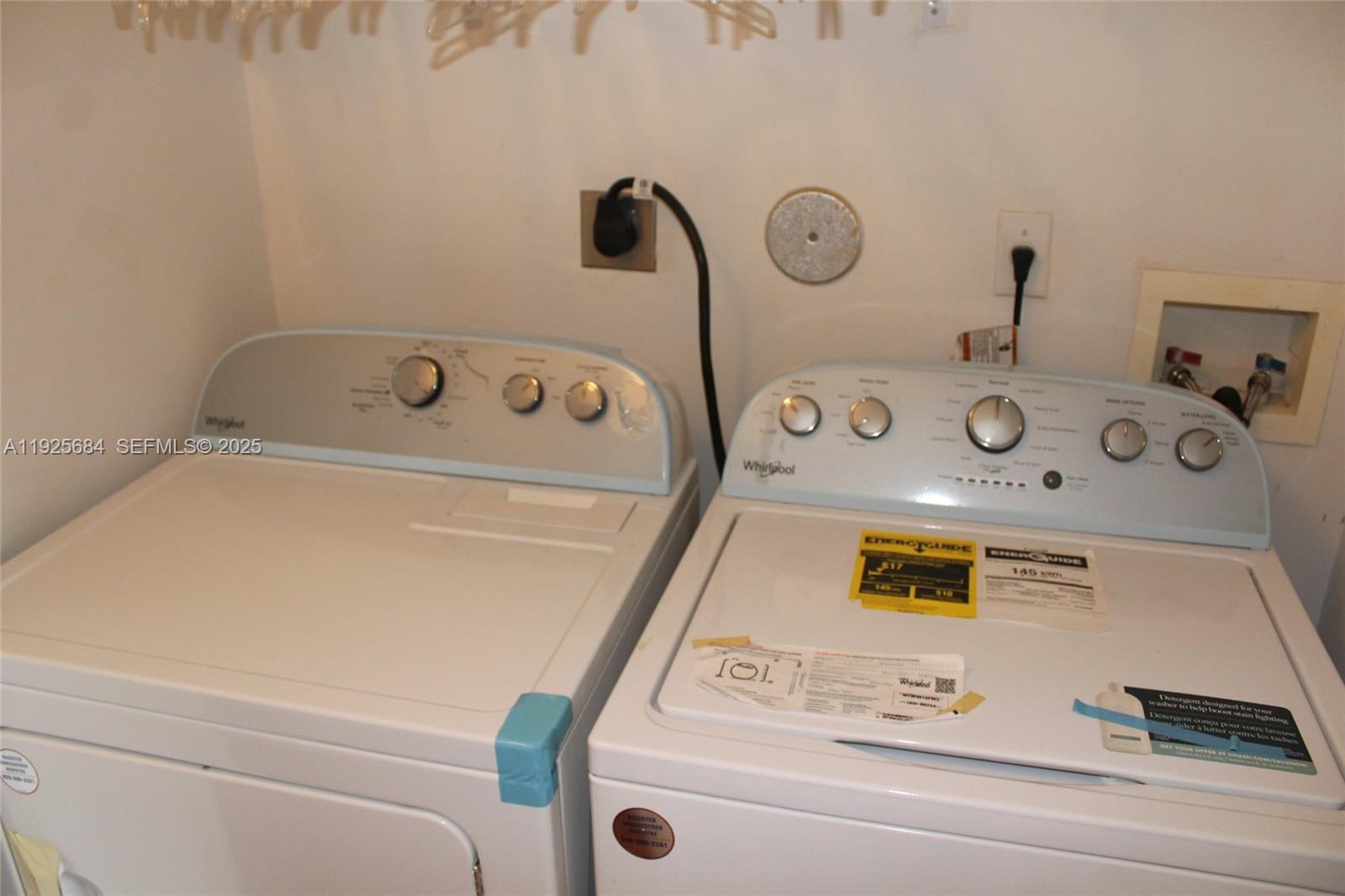 3433 Southwest 171st Terrace, Unit 3433 Miramar, FL 33027 - Photo 22 of 22 a utility room with washer and dryer