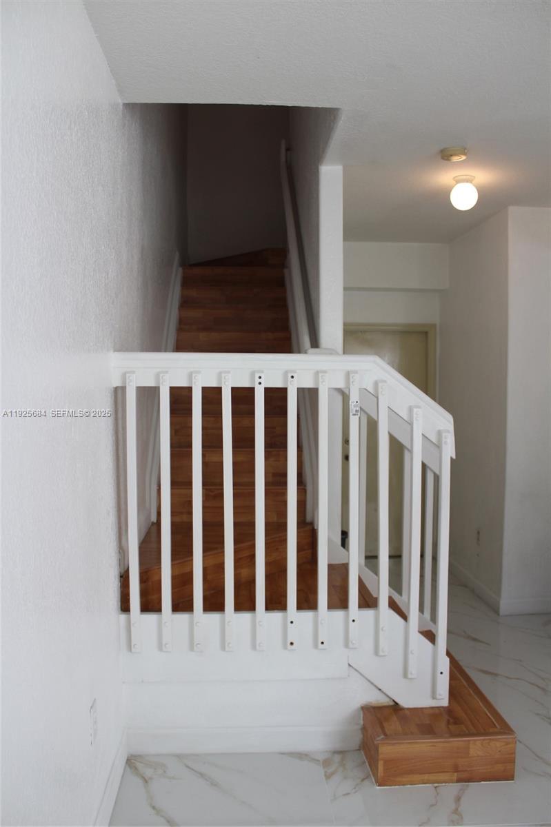 3433 Southwest 171st Terrace, Unit 3433 Miramar, FL 33027 - Photo 8 of 22 a view of wooden floor