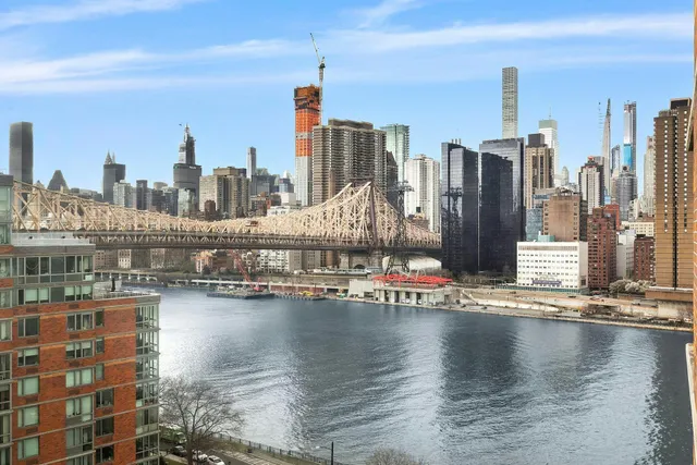 a bathroom with a sink a mirror toilet and bathtub