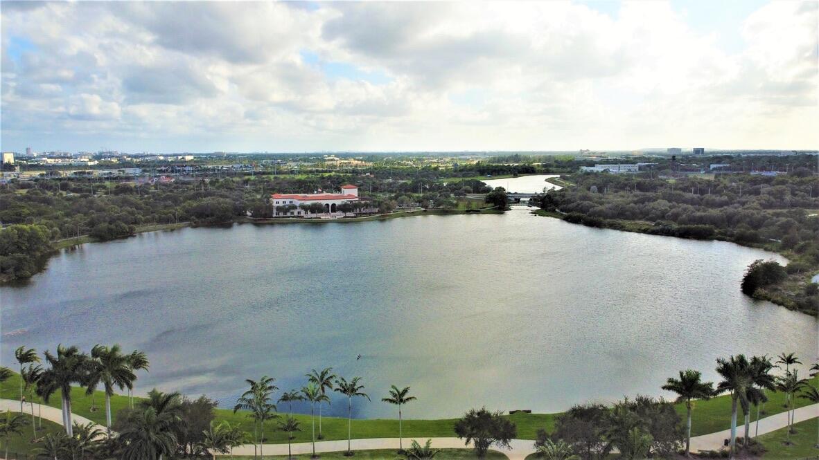 4866 Northwest 16th Avenue Boca Raton, FL 33431 - Photo 57 of 67 an aerial view of ocean and residential houses with outdoor space