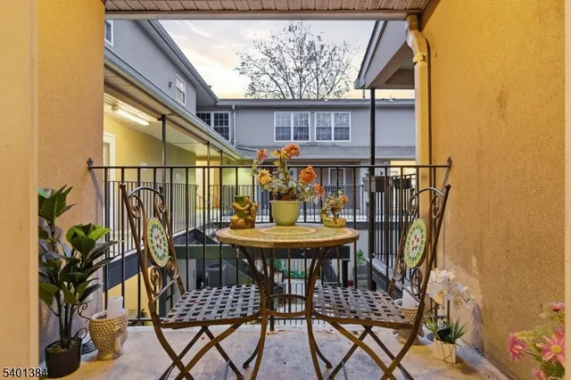a view of a house with wooden stairs