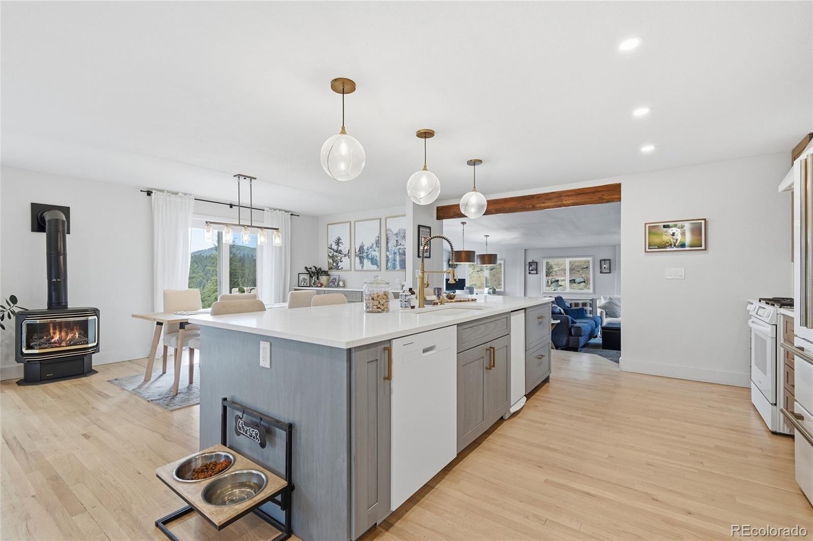 6387 High Drive Morrison, CO 80465 - Photo 17 of 49 a kitchen with sink cabinets and wooden floor