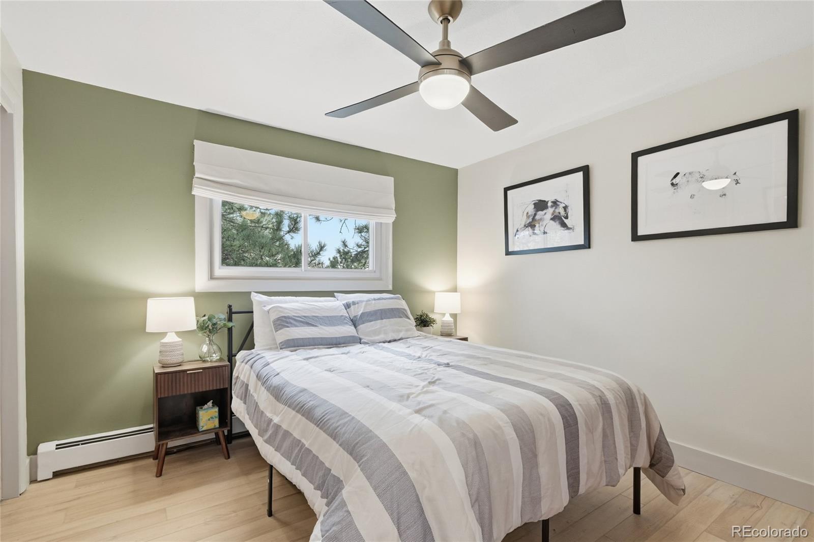 6387 High Drive Morrison, CO 80465 - Photo 21 of 49 a bedroom with a large bed and a window