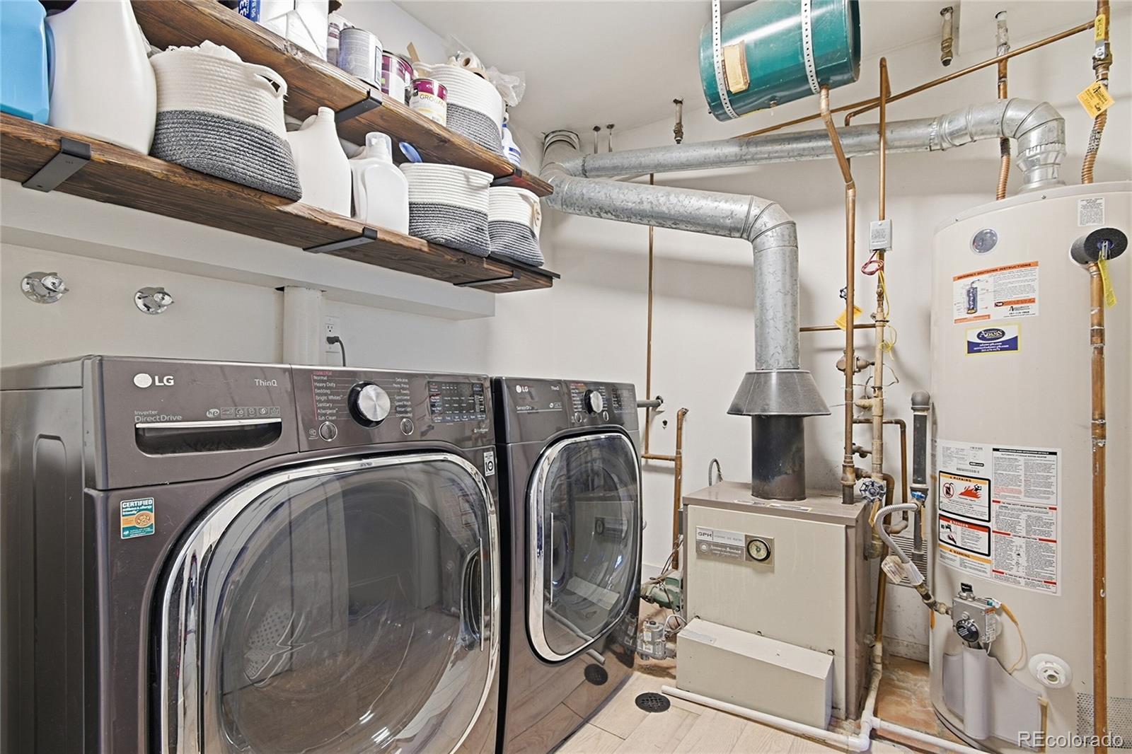 6387 High Drive Morrison, CO 80465 - Photo 32 of 49 a utility room with dryer and washer