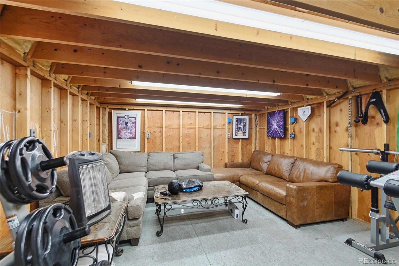 6387 High Drive Morrison, CO 80465 - Photo 33 of 49 a living room with furniture a couch and a window