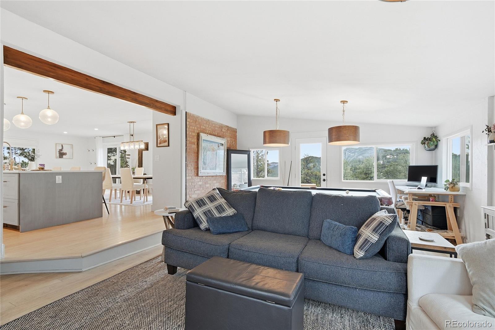 6387 High Drive Morrison, CO 80465 - Photo 4 of 49 a living room with furniture and a fireplace