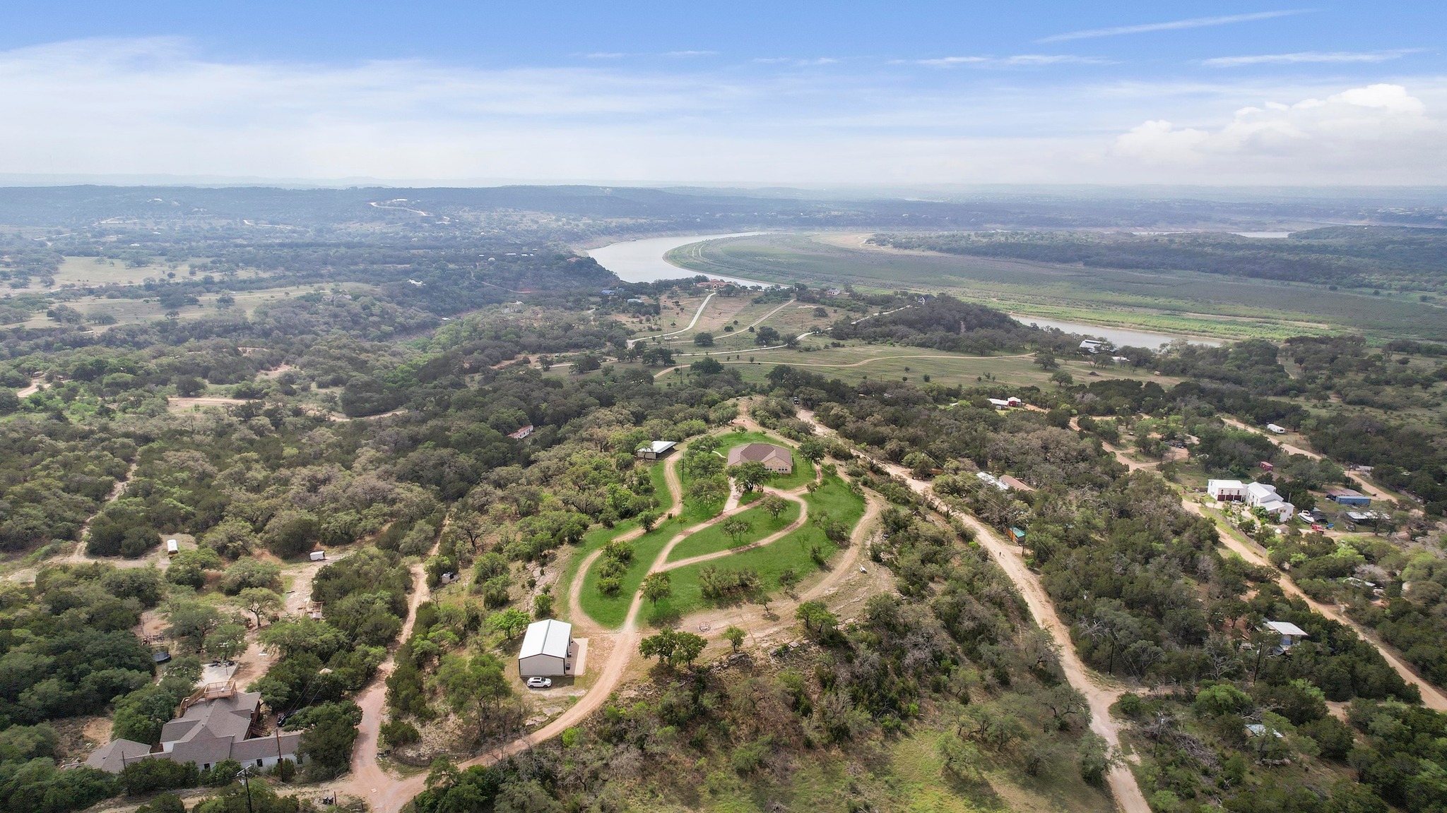 28701 Valley Road Marble Falls, TX 78654 - Photo 33 of 35 an aerial view of a houses with a yard