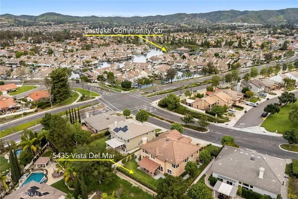 an aerial view of residential house with outdoor space