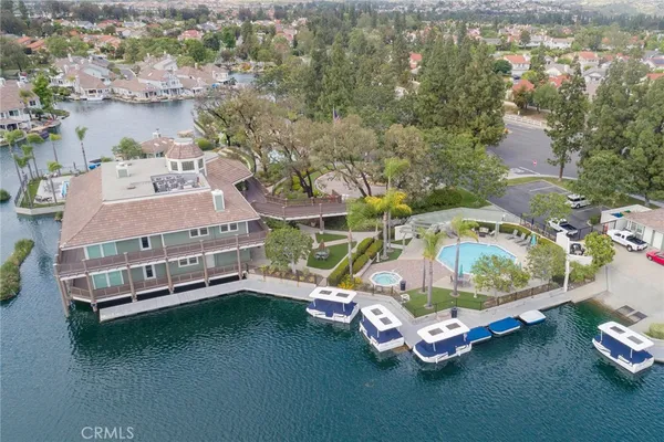 an aerial view of a house with outdoor space