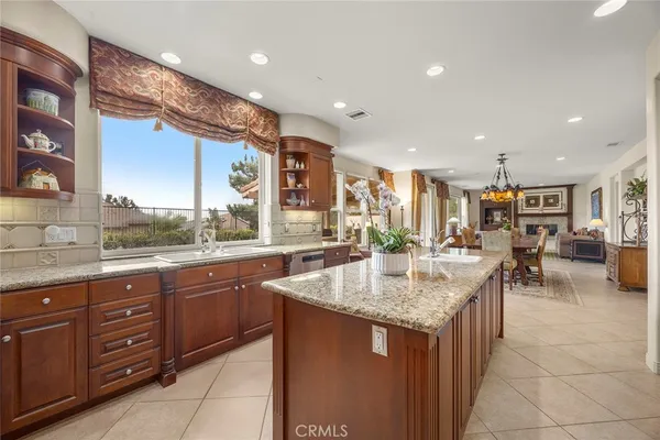 a kitchen with center island counter top space