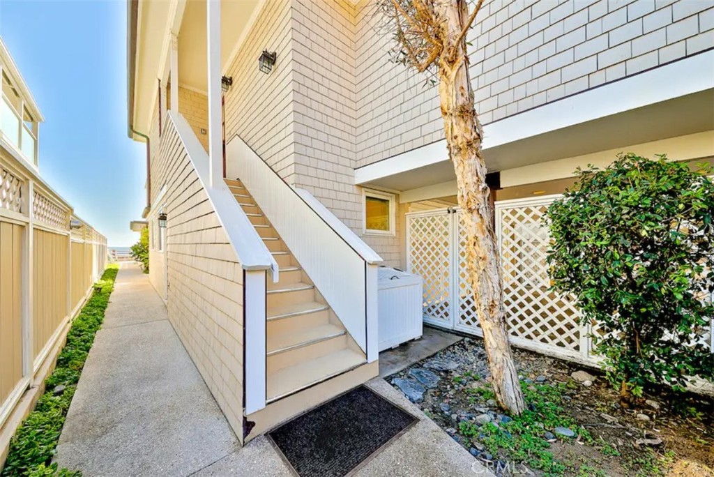 35087 Beach Road Dana Point, CA 92624 - Photo 17 of 25 a view of a house with wooden floor and iron stairs