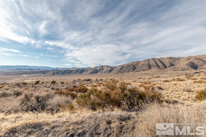 1310 Freds Mountain Road Reno, NV 89508 - Photo 7 of 13 a view of mountain with sunset