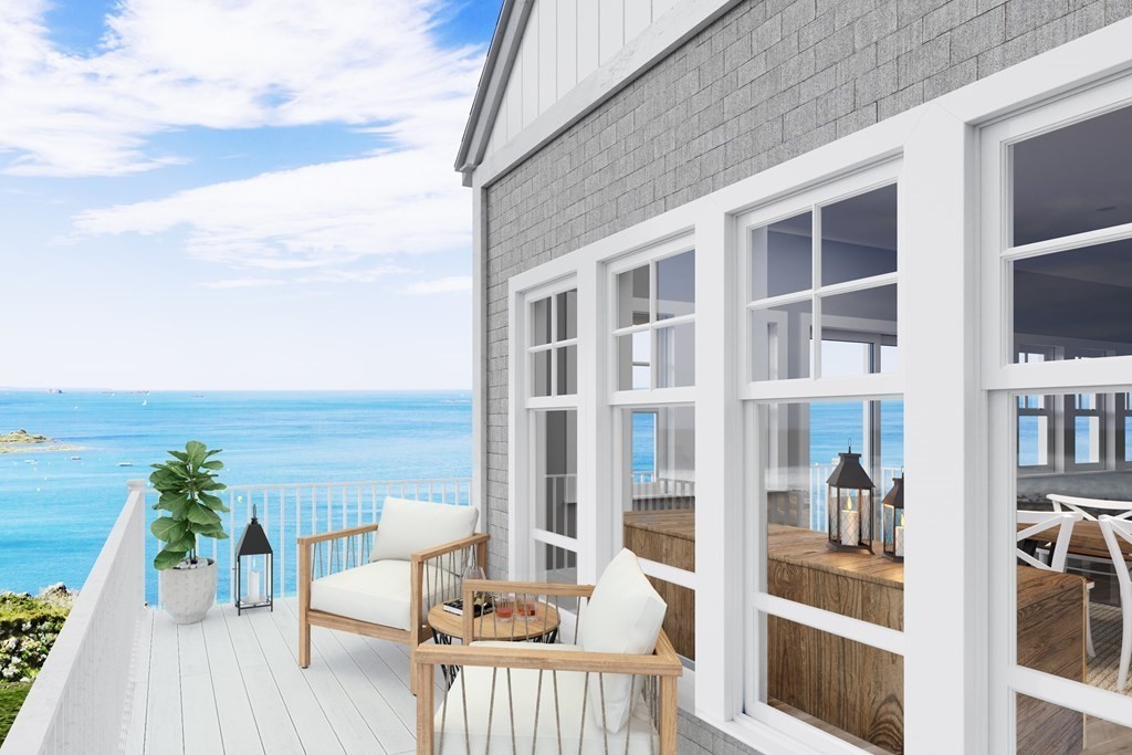 163 Atlantic Road, Unit 2 Gloucester, MA 01930 - Photo 13 of 16 a balcony with furniture and a potted plant