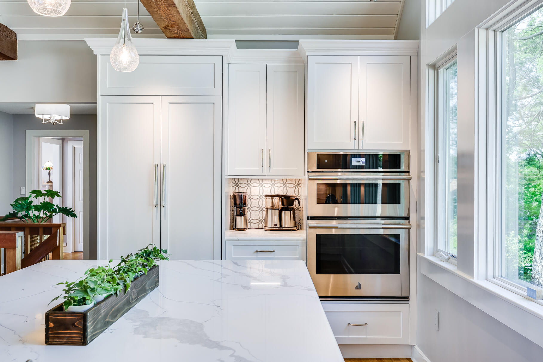 108 Bay Road Cotuit, MA 02635 - Photo 18 of 39 a kitchen with a stove and a refrigerator
