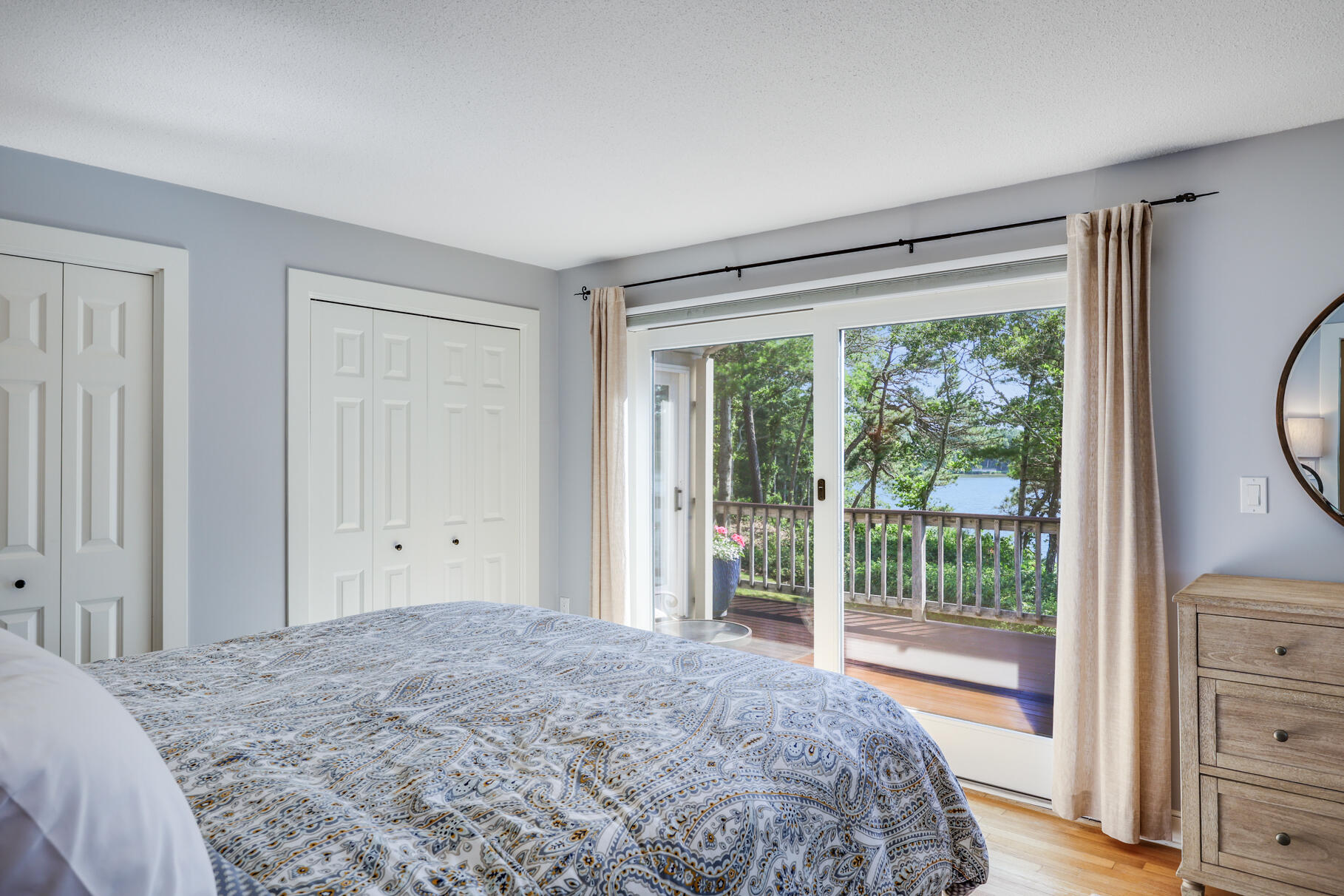 108 Bay Road Cotuit, MA 02635 - Photo 21 of 39 a bedroom with a large bed and a window