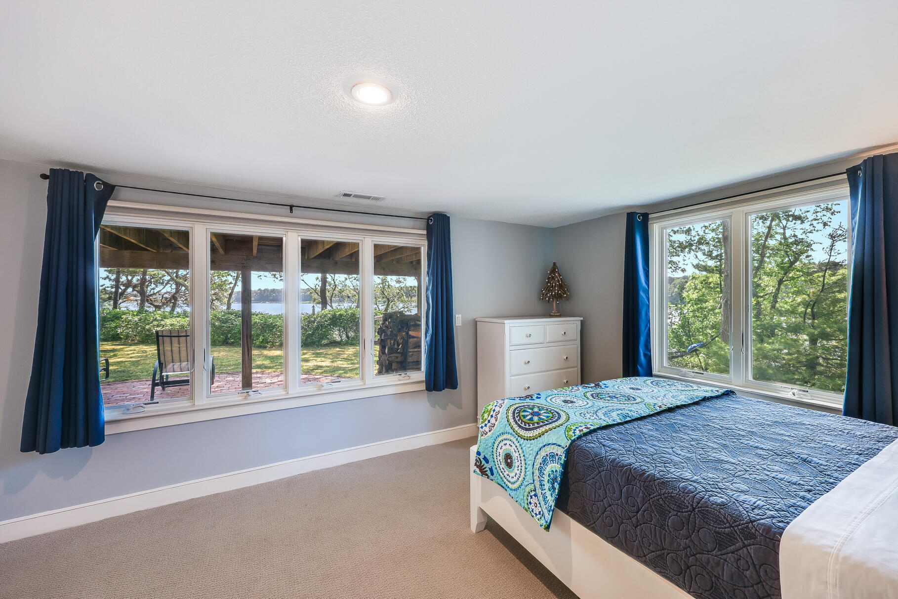 108 Bay Road Cotuit, MA 02635 - Photo 29 of 39 a bedroom with a bed and a large window