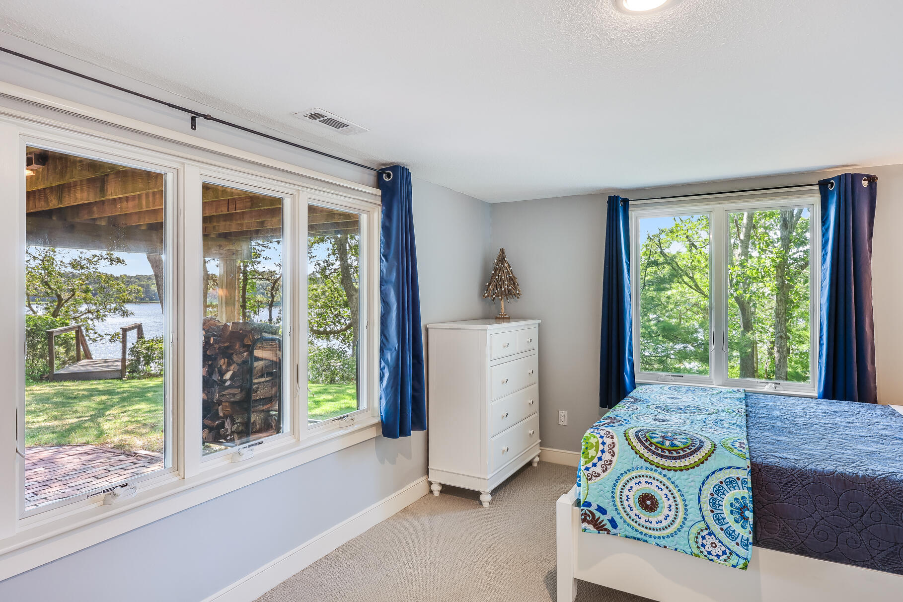 108 Bay Road Cotuit, MA 02635 - Photo 30 of 39 a bedroom with a bed and a window