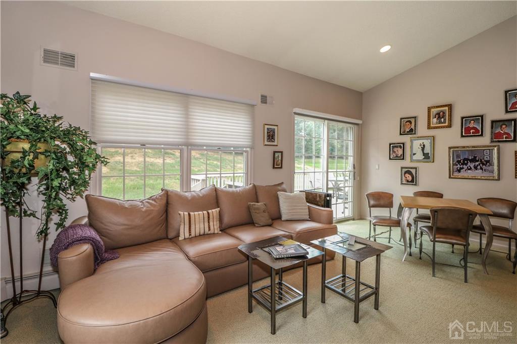 33 Whitehall Road Monroe Township, NJ 08831 - Photo 18 of 25 a living room with furniture and a large window