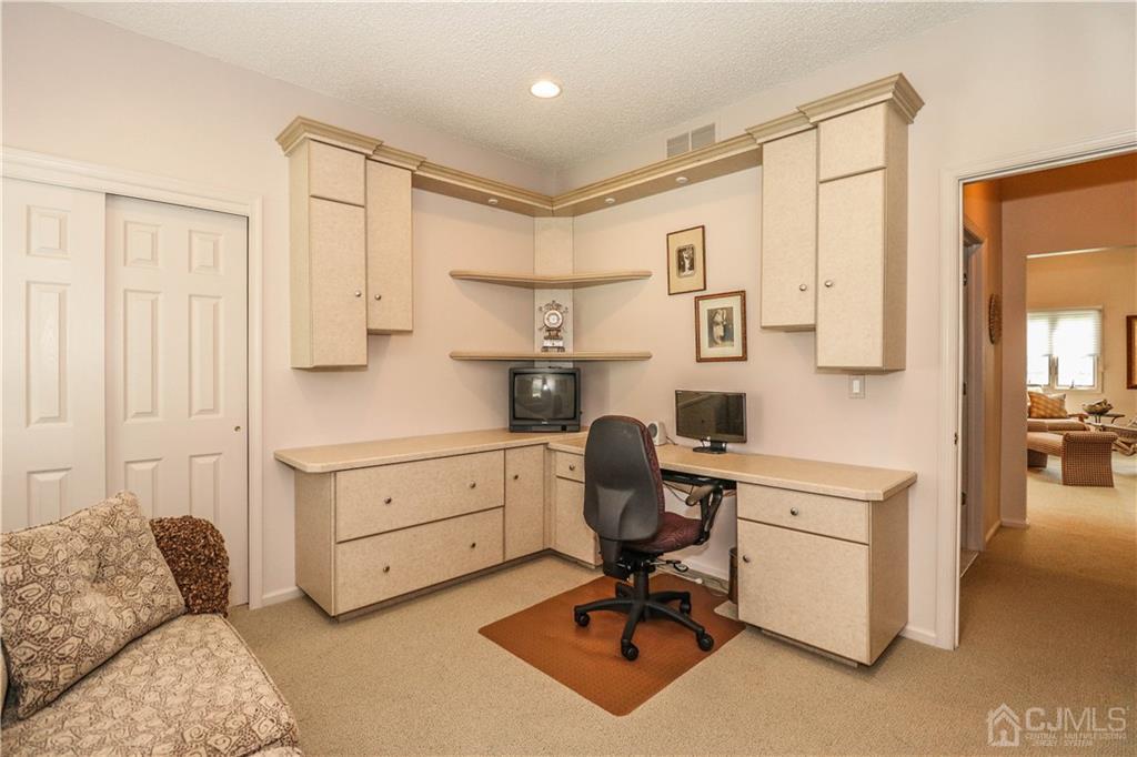 33 Whitehall Road Monroe Township, NJ 08831 - Photo 23 of 25 a view of a workspace with furniture and a window