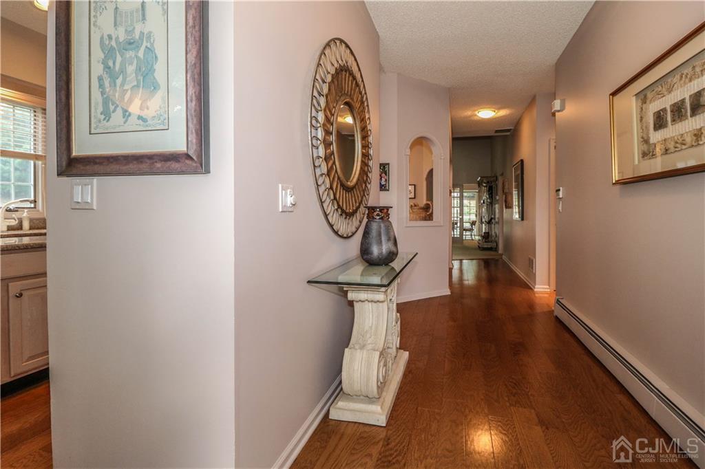 33 Whitehall Road Monroe Township, NJ 08831 - Photo 4 of 25 a view of entryway with wooden floor
