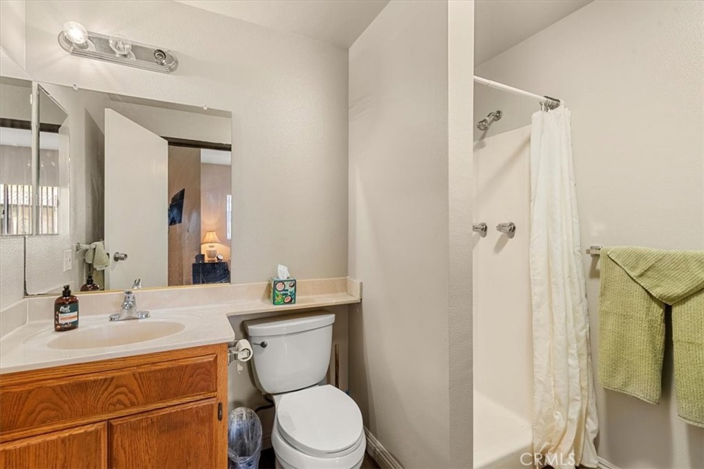 947 West 17th Street San Pedro, CA 90731 - Photo 11 of 24 a bathroom with a sink a toilet and shower