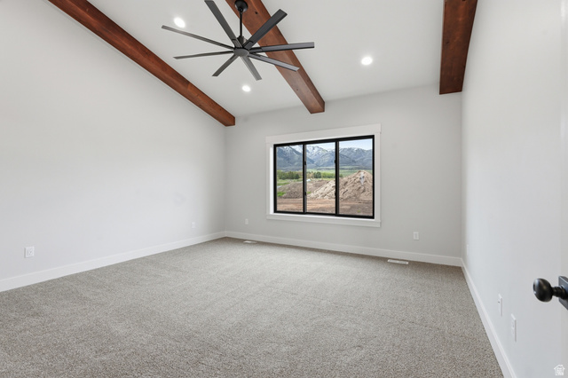 2970 North Mahogany Vly Road Logan, UT 84341 - Photo 11 of 39 Unfurnished room with light colored carpet, recessed lighting, vaulted ceiling with beams, and ceiling fan