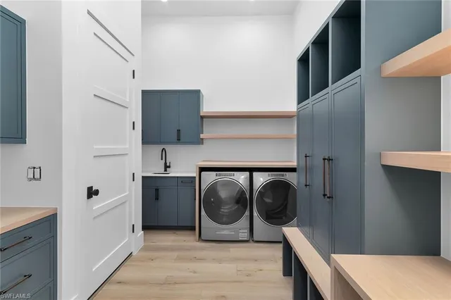 a kitchen with a refrigerator and cabinets