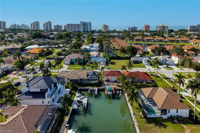 an aerial view of a city with lots of residential buildings