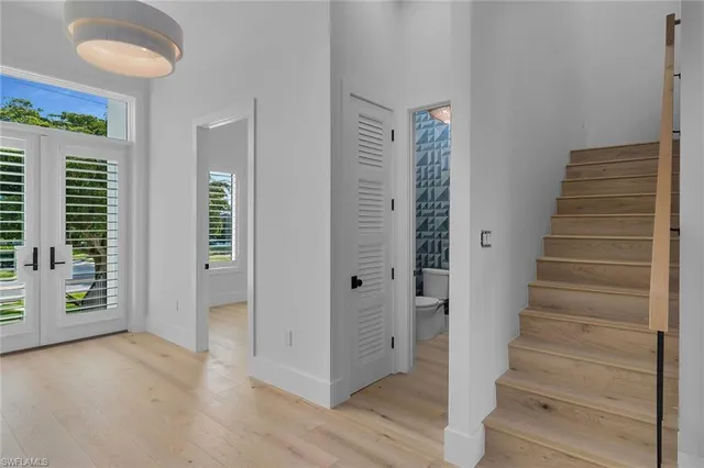 a view of an entryway with stairs