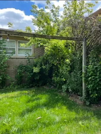 a view of a lake with a yard