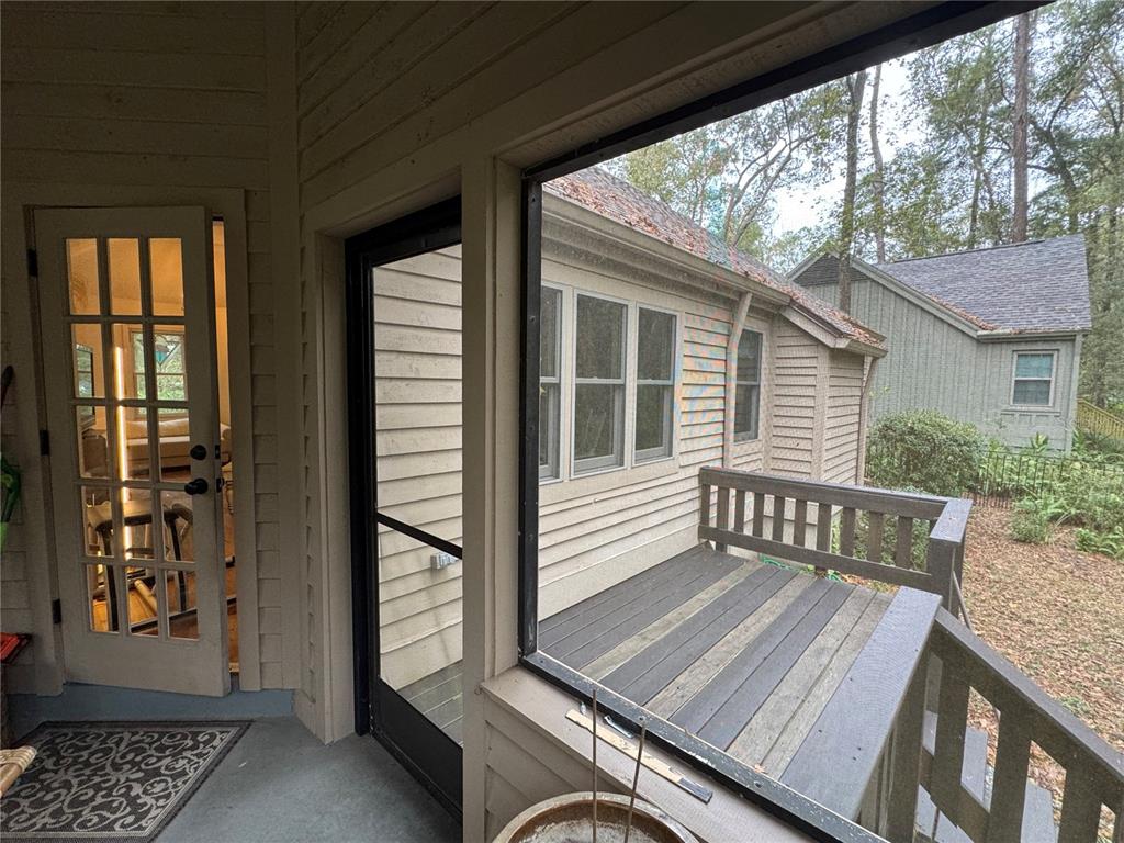 4623 Southwest 83 Drive Gainesville, FL 32608 - Photo 20 of 29 a view of a wooden deck