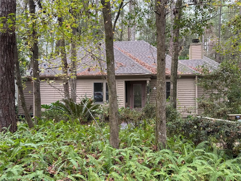 4623 Southwest 83 Drive Gainesville, FL 32608 - Photo 2 of 29 a house view with a backyard space