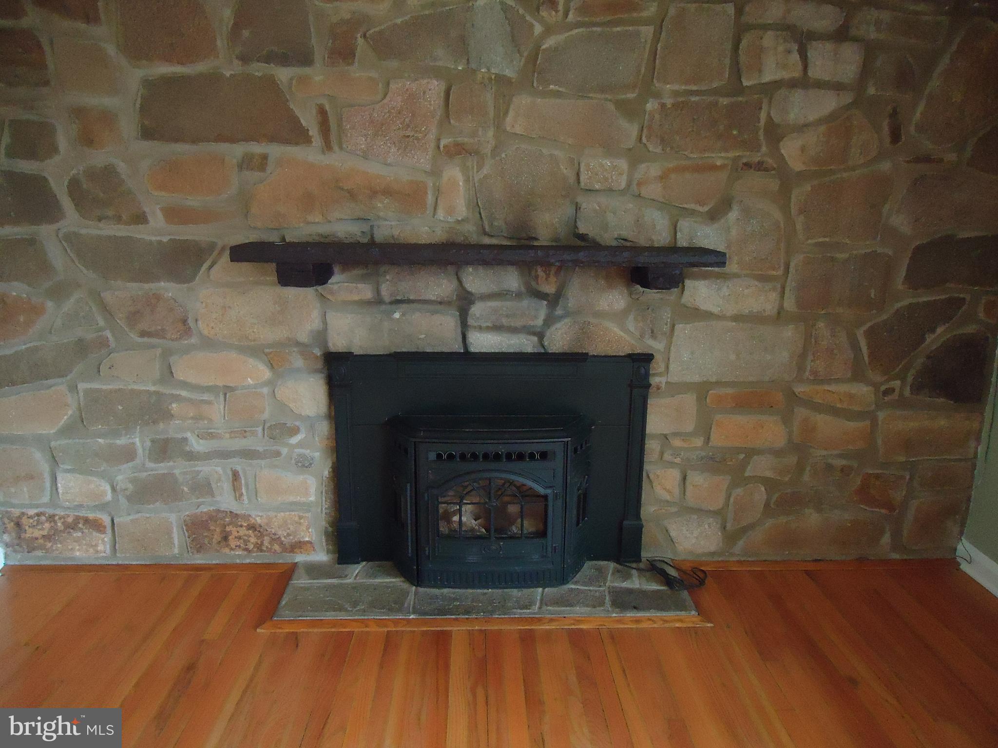 1402 Vermont Road Bel Air, MD 21014 - Photo 6 of 43 Warm Pellet Stove