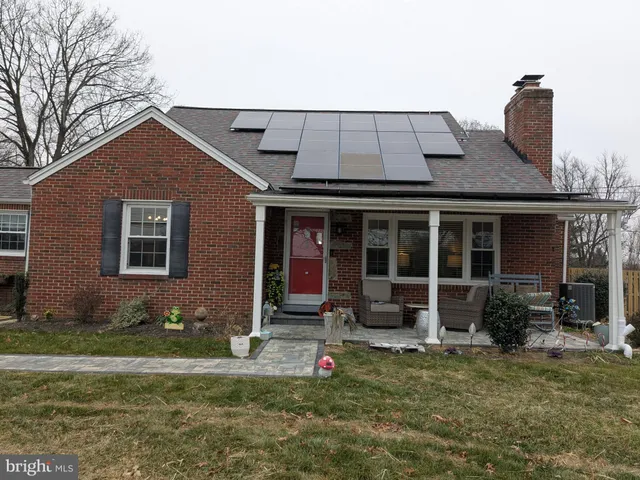 a house view with a garden space
