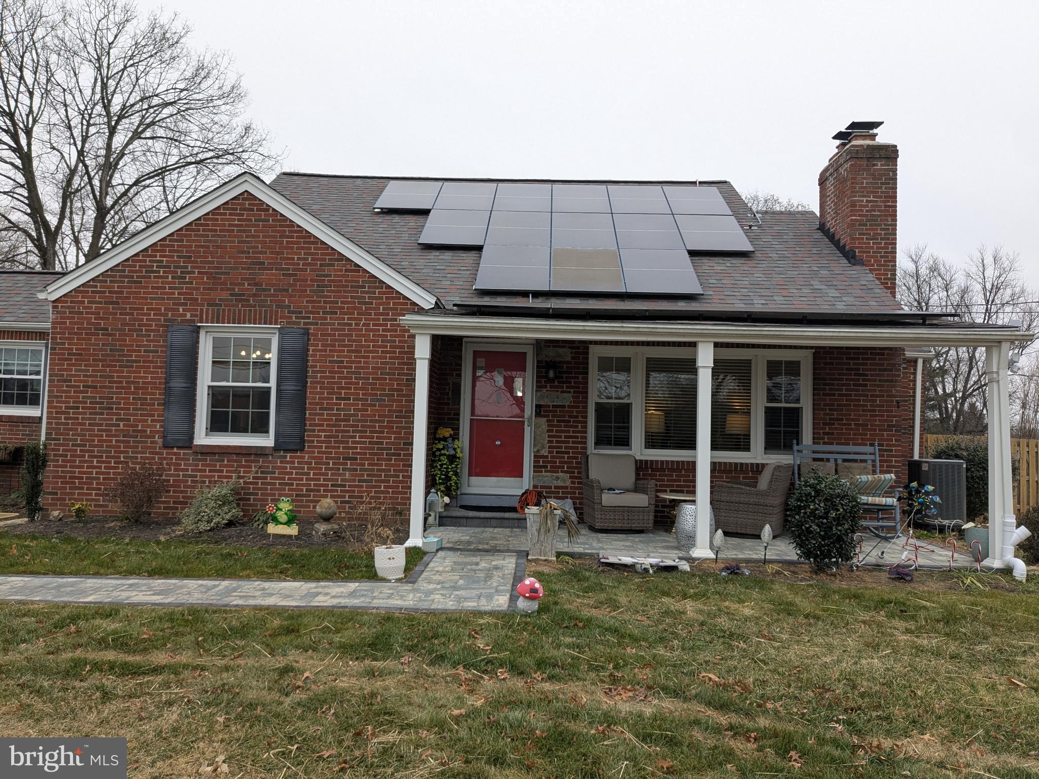 a house view with a garden space