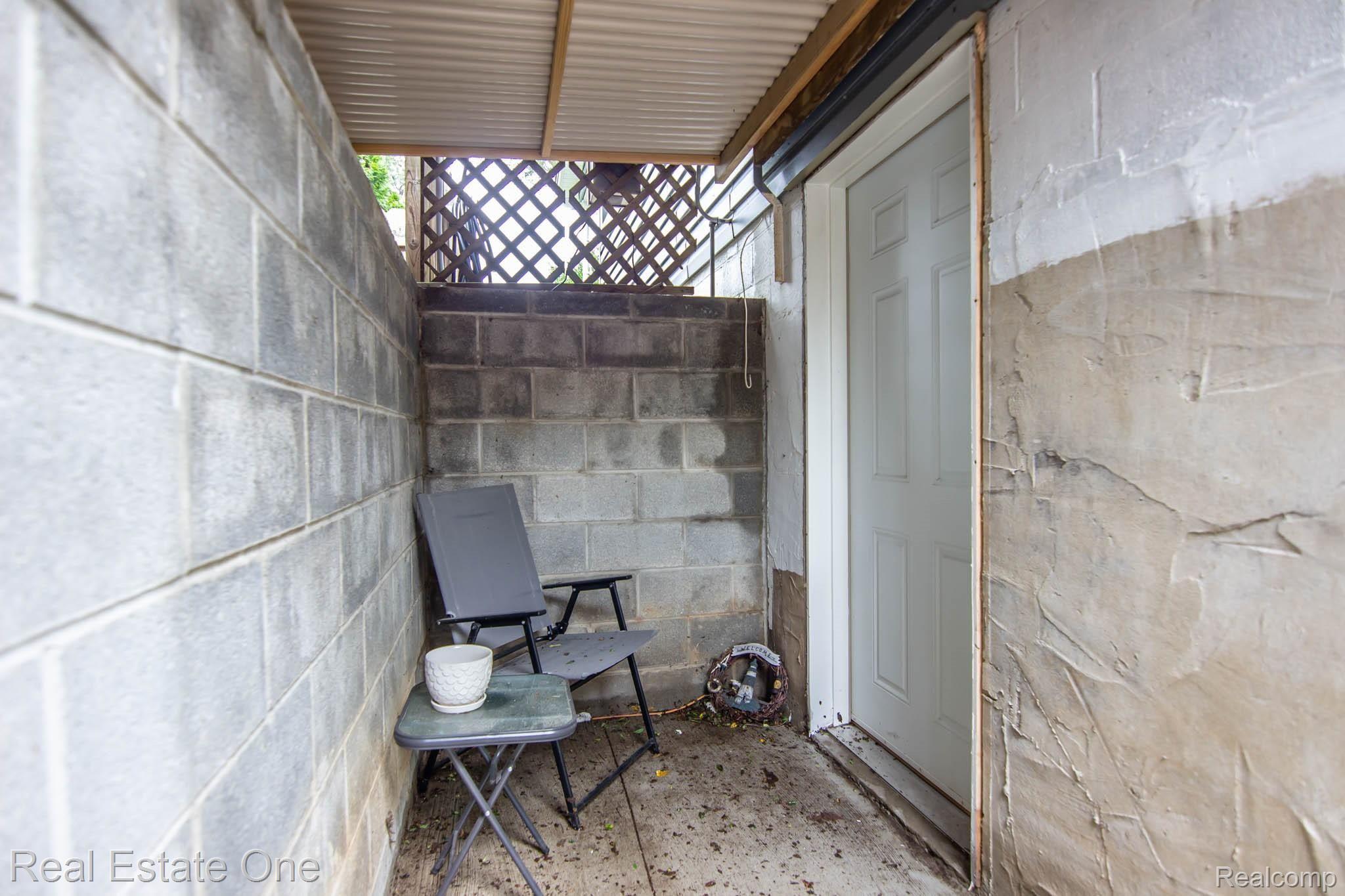 6401 Hatchery Road Waterford, MI 48327 - Photo 29 of 37 029_BasementExteriorDoor_6401Hatchery.jpg