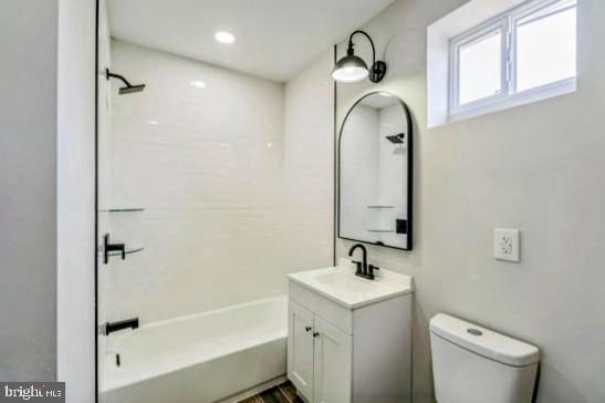 1637 South Ithan Street Philadelphia, PA 19143 - Photo 4 of 8 a bathroom with a sink a toilet and shower